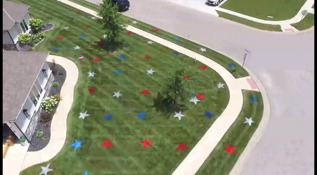 Red, white and blue patriotic lawn star display in Kansas City